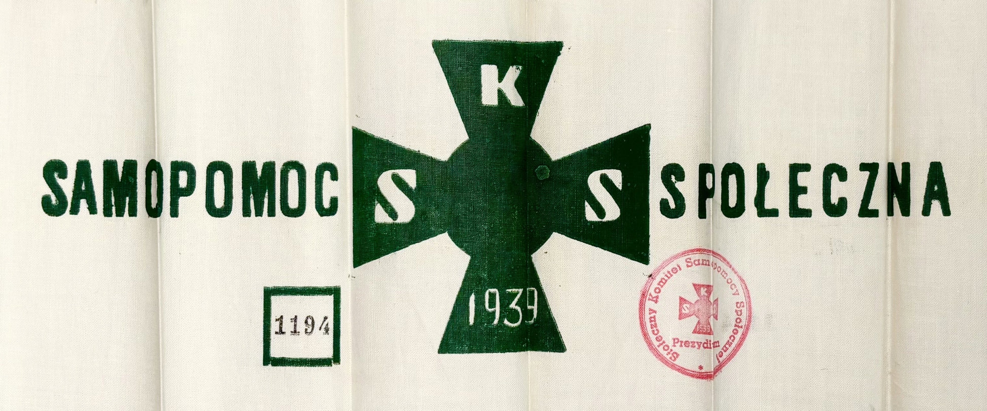 Trzy przepaski Stołecznego Komitetu Samopomocy Społecznej z kopertą [1939]